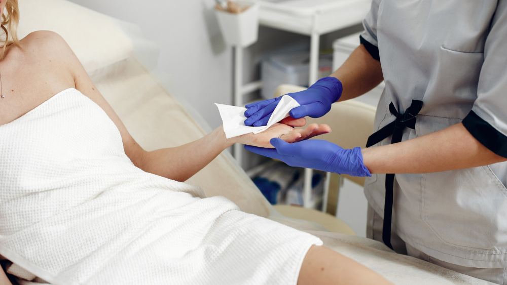 Young woman in laser hair removal clinic