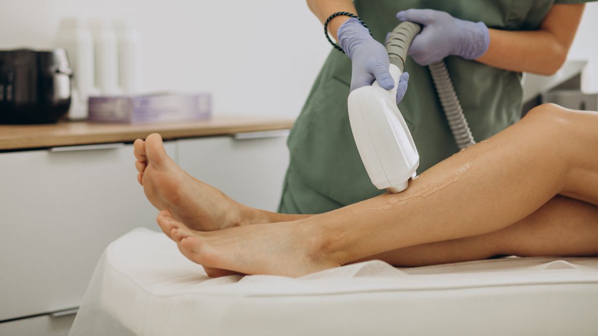 Woman's legs under laser hair removal treatment